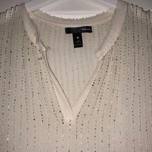 White beaded sleeveless blouse